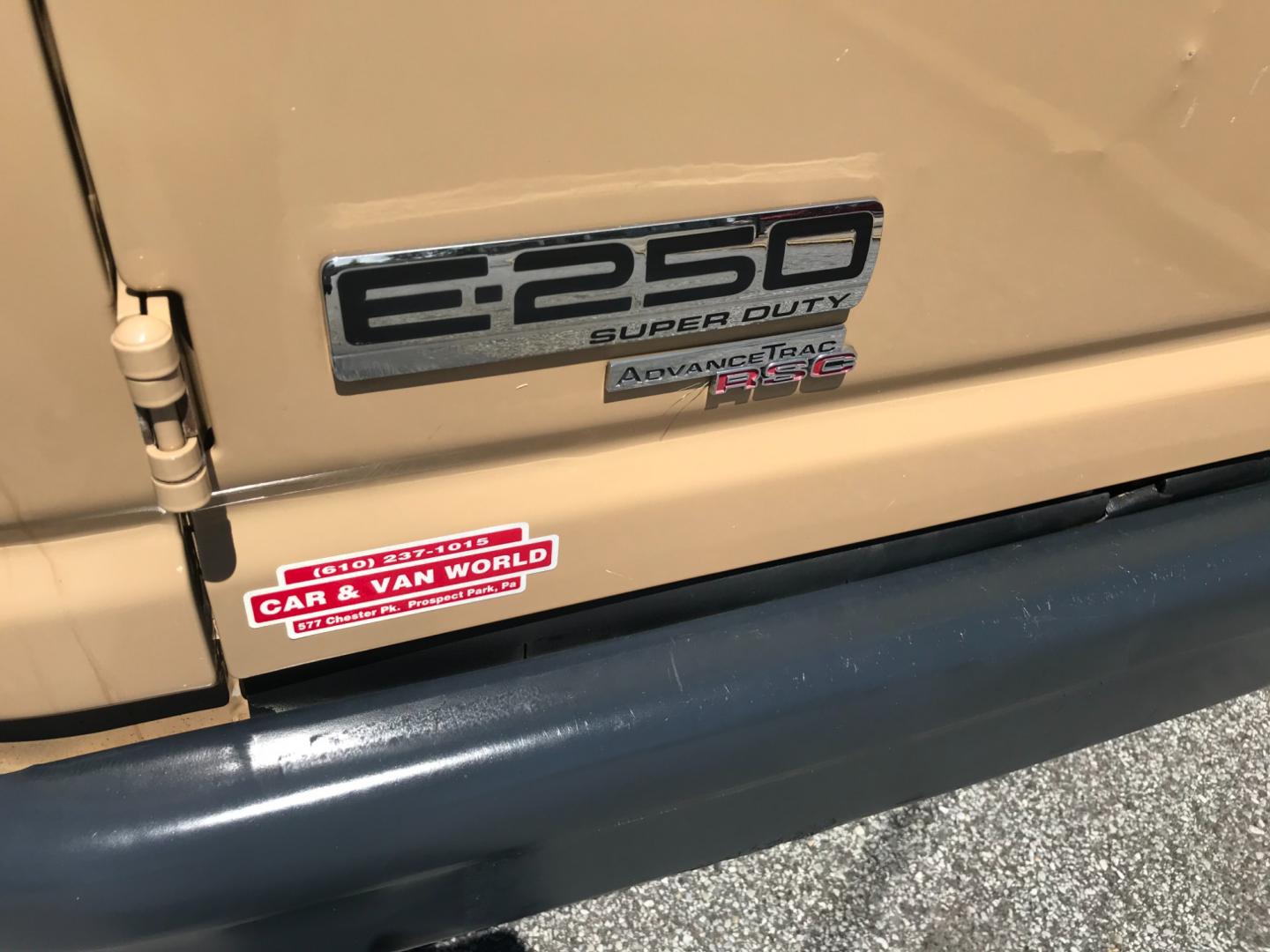 2011 Tan /Gray Ford E-Series Van E250 (1FTNE2EW5BD) with an 4.8 V8 engine, Automatic transmission, located at 577 Chester Pike, Prospect Park, PA, 19076, (610) 237-1015, 39.886154, -75.302338 - 2011 Ford E250 Cargo Van: Ladder racks, shelving, heavy duty partition, power inverter, fully metal body, FLEET MAINTAINED, runs LIKE NEW! This vehicle comes inspected and has been given a bumper to bumper safety check. It is very clean, reliable, and well maintained. We offer a unique pay plan t - Photo#6